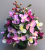 Artificial flower arrangement with orchids