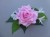 Corsage with artificial pink rose