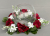Candle ring with artificial dark-red roses and jasmine