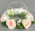 Candle ring with artificial cream-peach roses and jasmine