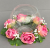Candle ring with artificial dark pink roses and gypsophila