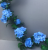 Garland with light blue roses and hydrangeas