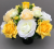 Pot for memorial vase with artificial white and yellow roses