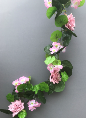 Garland with geranium and vintage pink roses