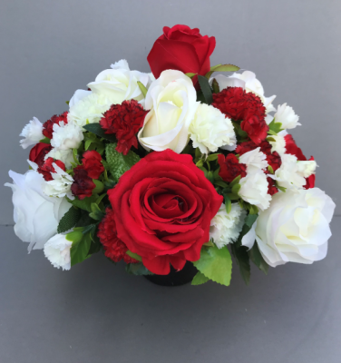 Cemetery pot with white carnations