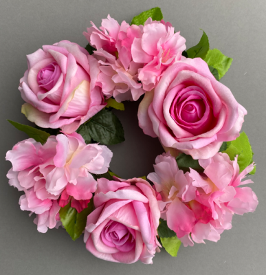 Candle ring with artificial large-pink roses and blossom