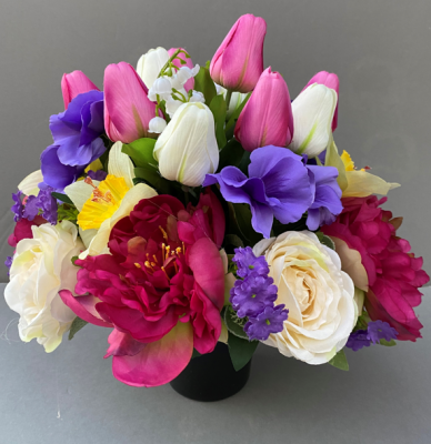 Cemetery pot with artificial magenta peonies and purple pansies