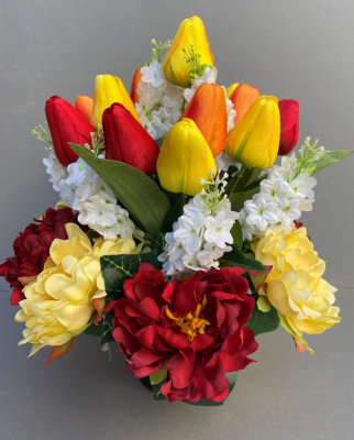 Cemetery pot with red yellow orange tulips
