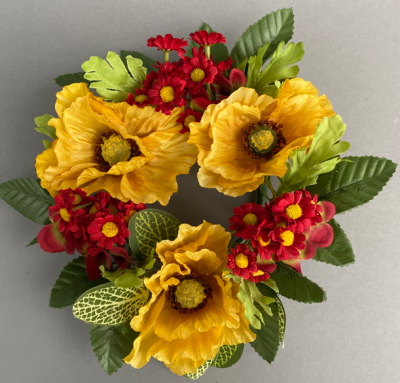 Candle ring with artificial mustard poppies and daisies
