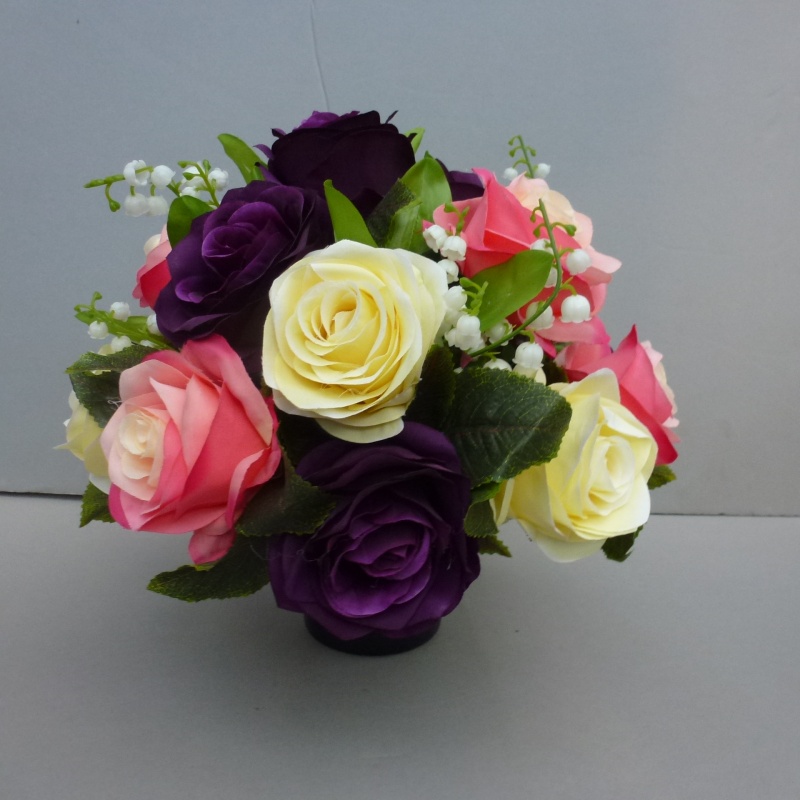 Pot for memorial vase with artificial pink purple yellow roses