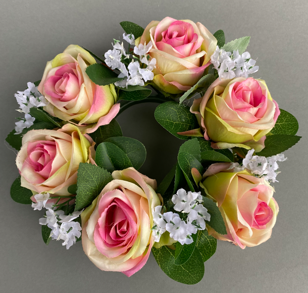 Candle ring with artificial pink-green roses and gypsophila