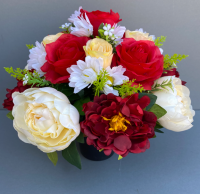 Pot for memorial vase with red roses and yellow peonies