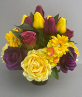 Cemetery pot with artificial purple and yellow roses